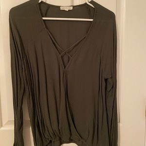 Dark green long sleeve cross strap blouse